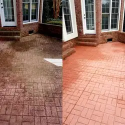 Before and after pressure cleaning of a stained stamped concrete patio