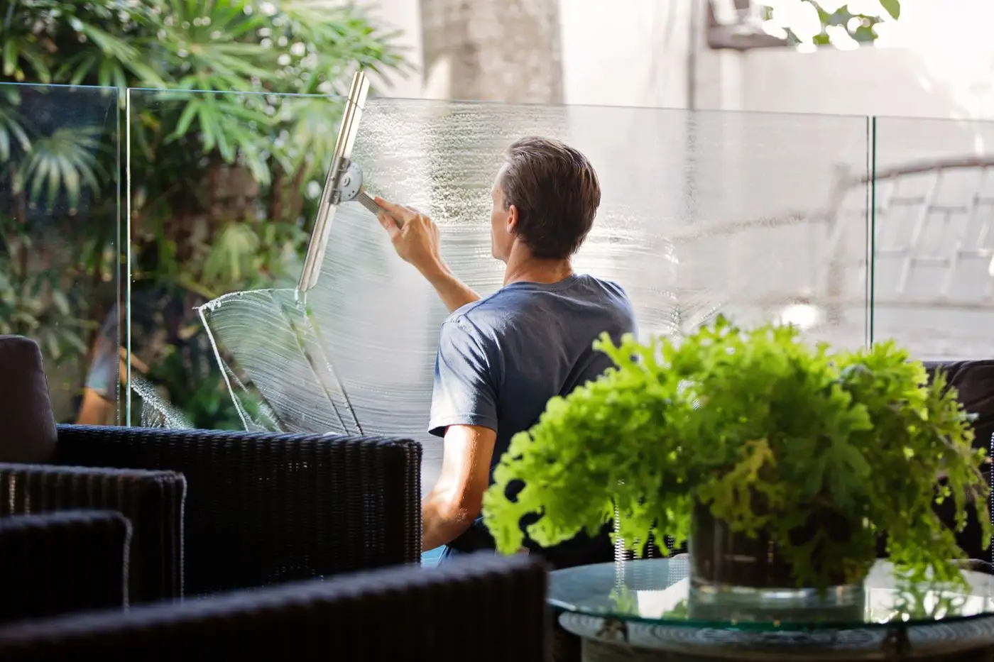 Window cleaning provider example using a squeegee